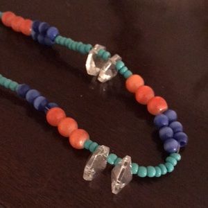 Orange, green and blue beaded necklace with clear beads